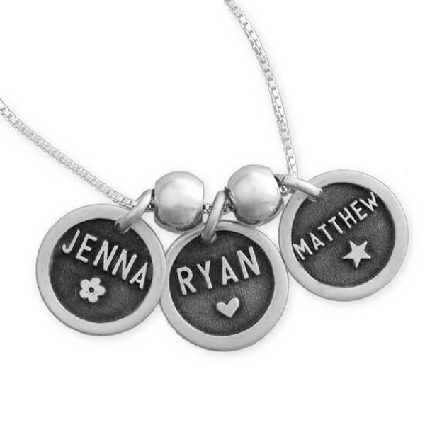 Silver Etched Name Disc Necklace personalized with kids names, shown close up on white