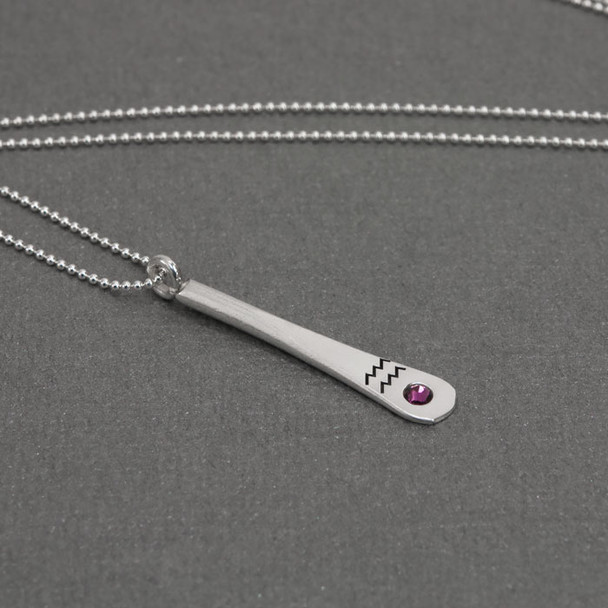 Side view of fine silver custom Zodiac Pendant, personalized with zodiac symbol & matching birthstone
