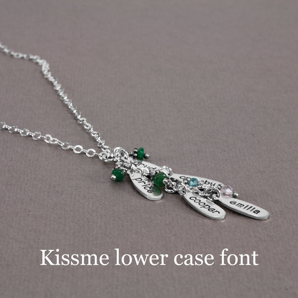 Side view of custom Sterling Silver Cascade Necklace with birthstones, using Kissme lower font