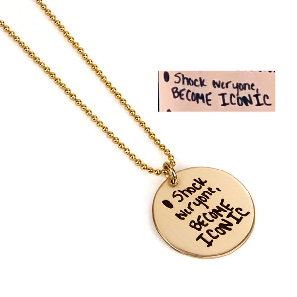 Custom gold disc handwriting necklace, personalized with inspirational note from sister, shown on white with original handwritten note