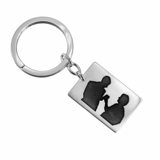 Anniversary gift with silhouette of couple on a silver Key Ring