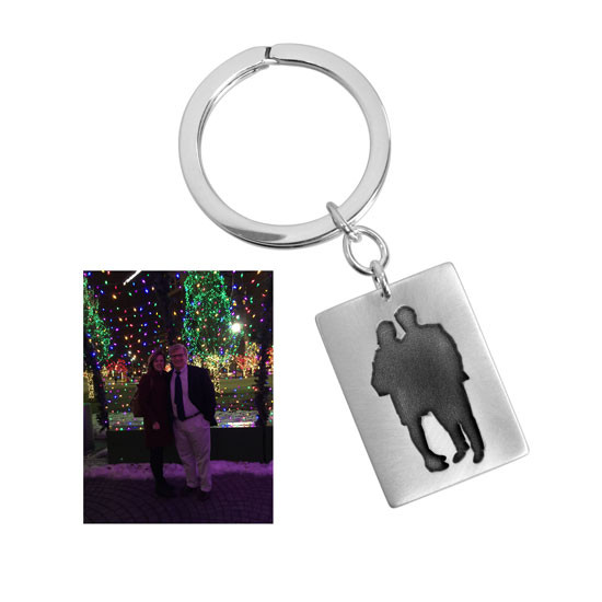 Anniversary gift with silhouette of couple on a silver Key Ring, with the original photo used to personalize it