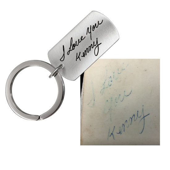 Faded handwriting used on a silver key ring