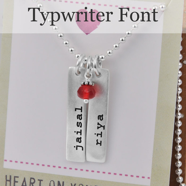 Custom sculpted silver long rectangle, personalized with hand stamped kids' names and birthstone, stamped in Typewriter Lowercase font