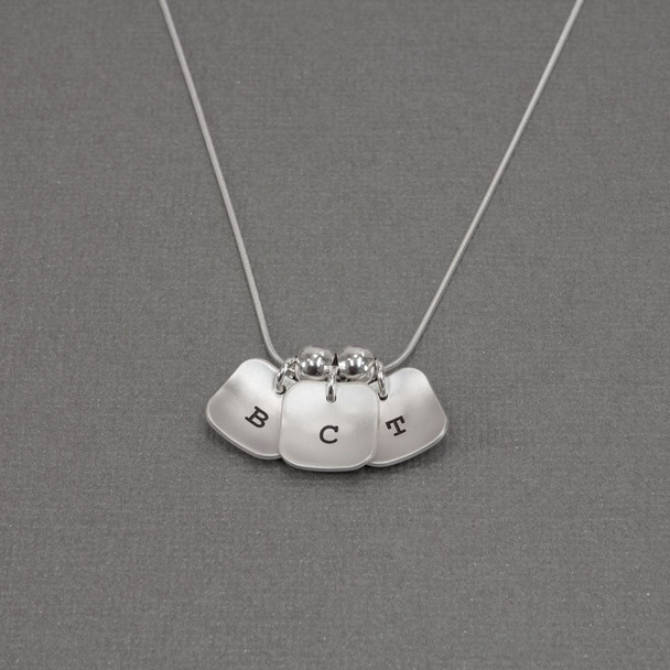 hand stamped brushed silver squares initial necklace