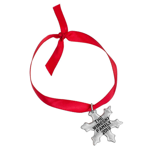 Custom Hand stamped fine pewter snowflake ornament, personalized with your message, shown on white