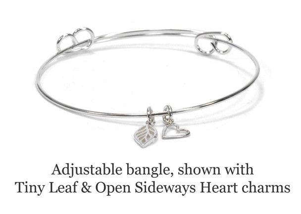 Adjustable Bangle, shown with Tiny Leaf & Open Sideways Heart charms