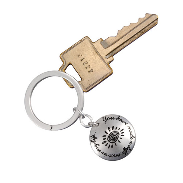 Sterling silver teacher key chain with message, "You have made a difference in my life" shown with key
