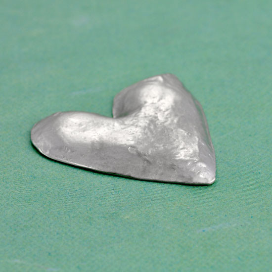 Heart pocket token side view