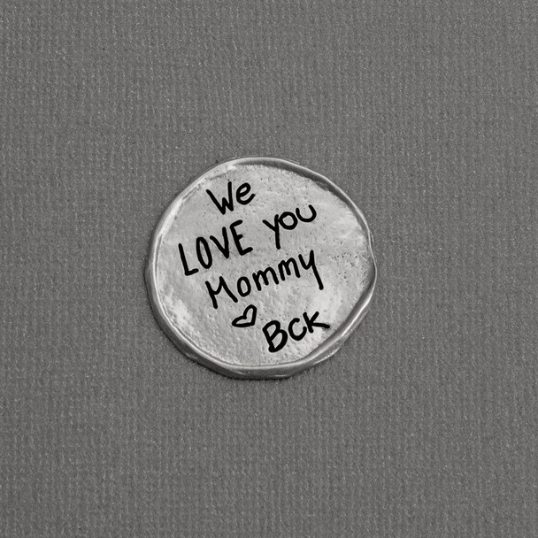 My Mantra Handwriting Pocket Token in fine pewter, shown from the top