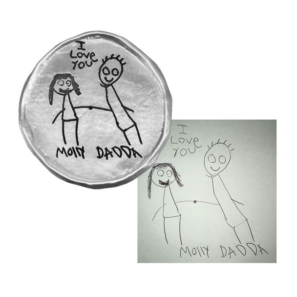 Custom My Mantra Handwriting Pocket Token in fine pewter, shown with child's artwork used to personalize the front of it