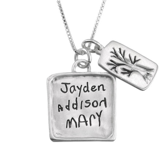Personalized silver square charm engraved with handwritten kids names, and hung with custom treen silver charm on a silver chain.