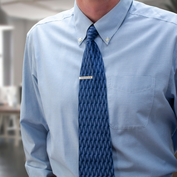 Personalized silver tie clip with handwriting. shown on model