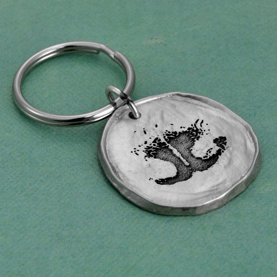 Custom nose print pewter key ring, made with your pet's actual nose print, shown from side