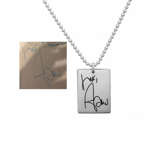 Custom necklace with handwritten note on custom silver rectangle tag, shown with original handwriting used to personalize it