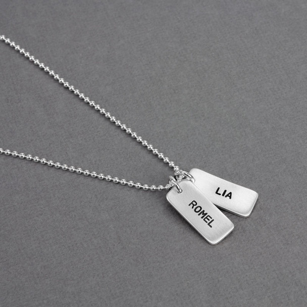 Side view of Sterling Silver Chunky Rectangle, stamped with kids' names
