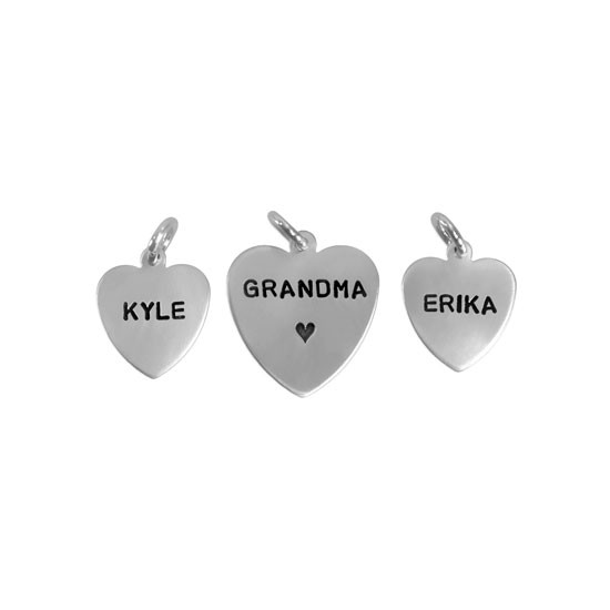 Hand stamped sterling silver heart charms in 1/2" and 5/8"