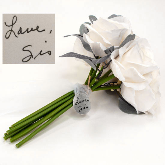 Custom handwritten note on bouquet charm with cross