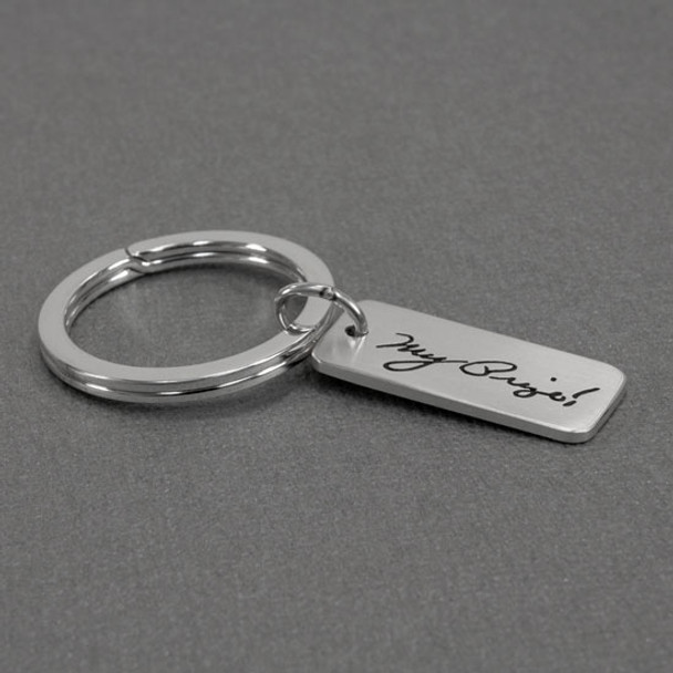 Silver Memorial key ring with actual handwriting, shown from the side