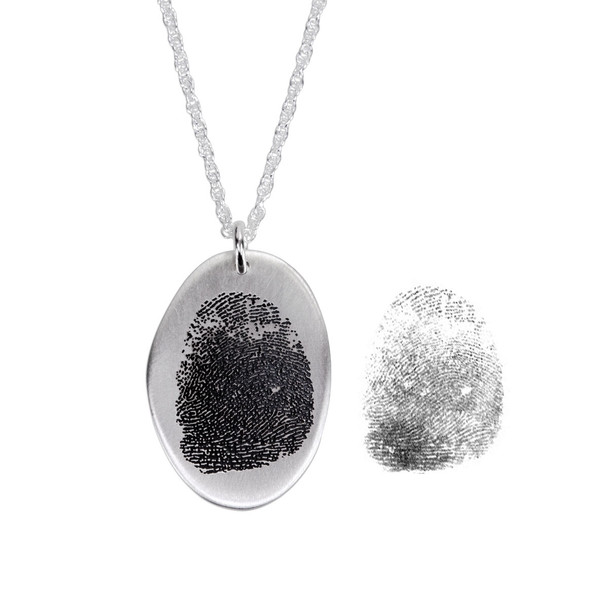Custom silver fingerprint necklace, shown with the fingerprint used to personalized it