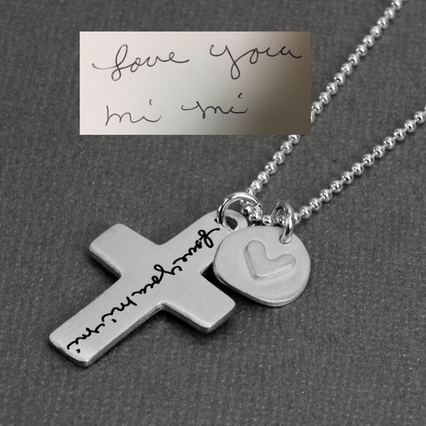 Custom silver Handwriting Cross Necklace, personalized with handwritten note Love You Mi Mi, shown from side close up, with original handwriting
