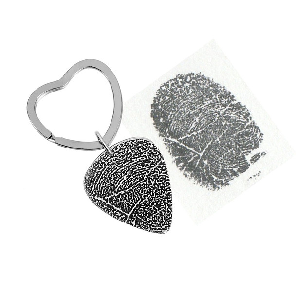 Custom actual fingerprint on guitar pick necklace sterling silver, shown with original fingerprint, with entire charm used for the print