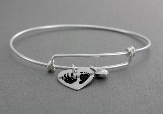 Expandable bracelet with custom handprint or footprint charms