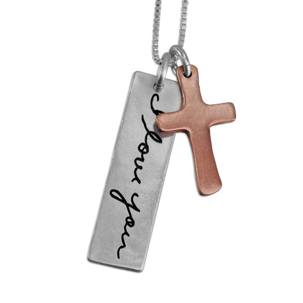 Custom silver handwriting tag with copper cross memorial necklace, shown on white