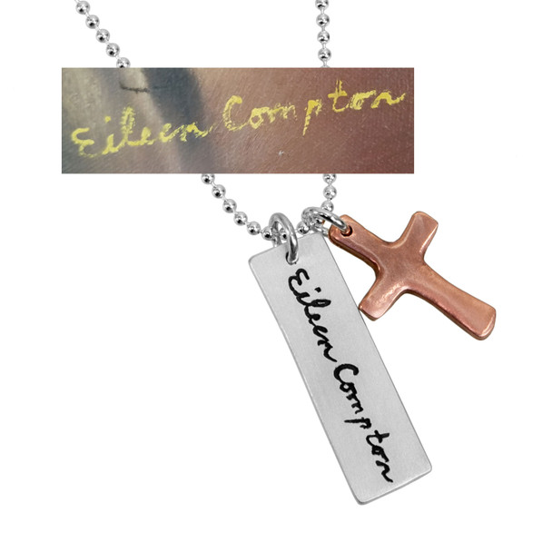 Custom silver handwriting tag with copper cross memorial necklace, shown on white with the original handwriting
