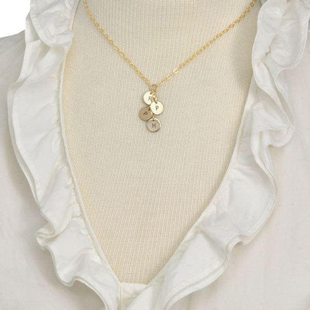 Gold cascading initial necklace