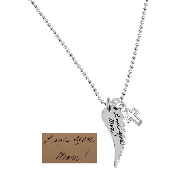 Custom Handwriting Memorial Charm Silver Angel Wing Necklace, shown with handwritten message from mom used to personalize it