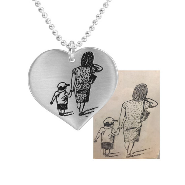 Handwritten drawing on silver necklace, , shown with handwritten drawing used to personalize it
