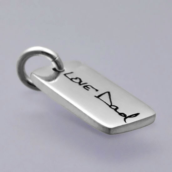 Dainty Custom Silver Handwriting Tag necklace, personalized with loved one's signature "Love Dad", shown from the side