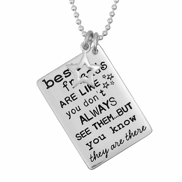 Silver custom Best friends necklace, with "Friends are Like Stars" hand stamped on the front, shown close up on white