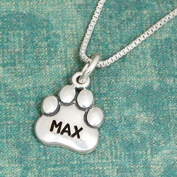 Large Sterling Paw Charm with name Max stamped on it, shown on sterling silver chain