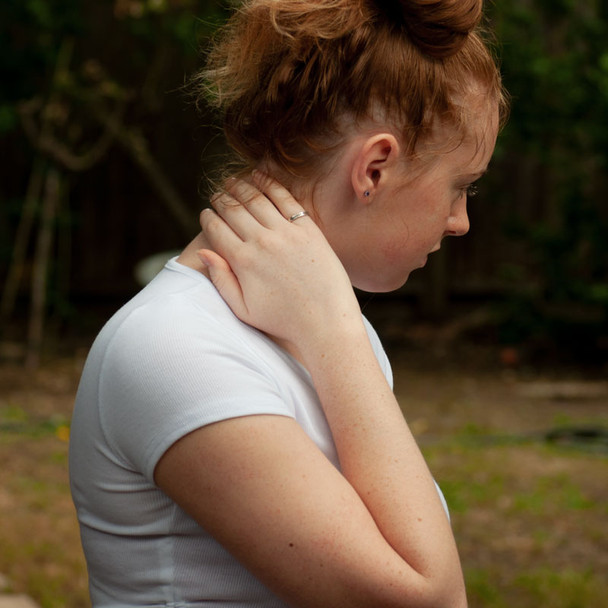 Hand stamped sterling silver stackable rings shown on a model