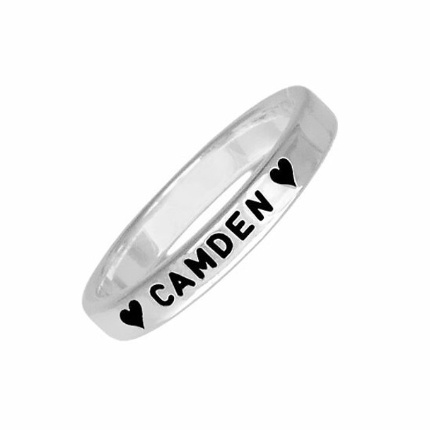 Hand stamped sterling silver stackable rings, personalized with child's name Camden and hearts, shown close up on white
