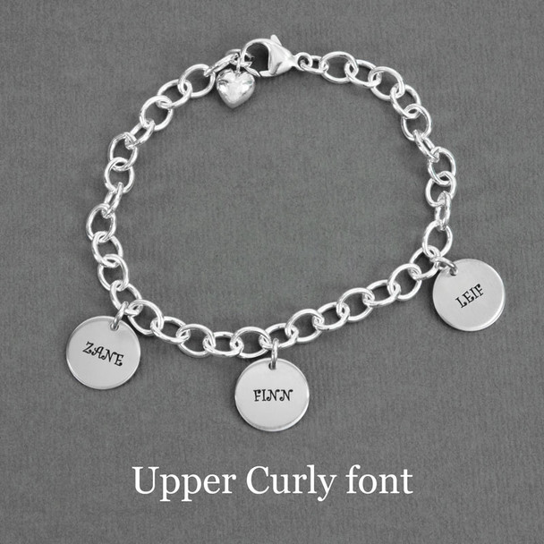 Hand stamped sterling silver custom mom bracelet, stamped with kids names in Upper Curly font