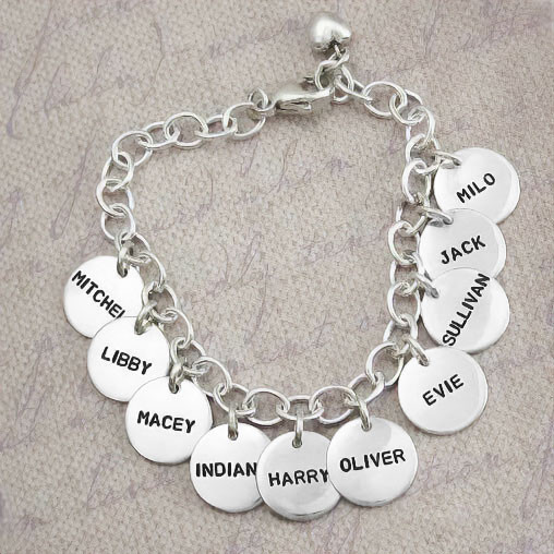 Hand stamped sterling silver custom bracelet for grandma, stamped with lots of grandkids' names