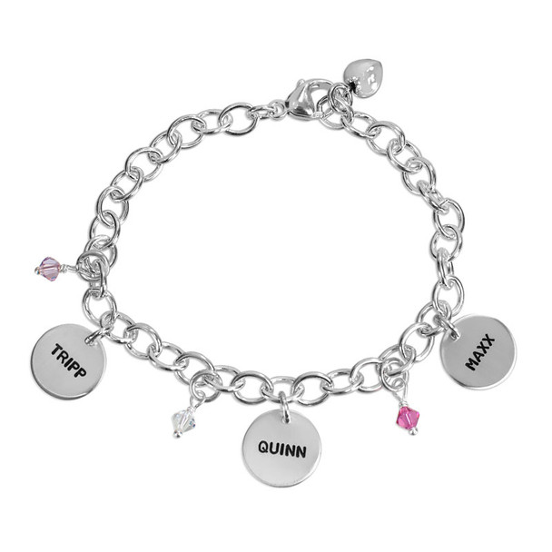 Hand stamped sterling silver custom mom bracelet, stamped with kids' names, with matching birthstones for each child, shown on white