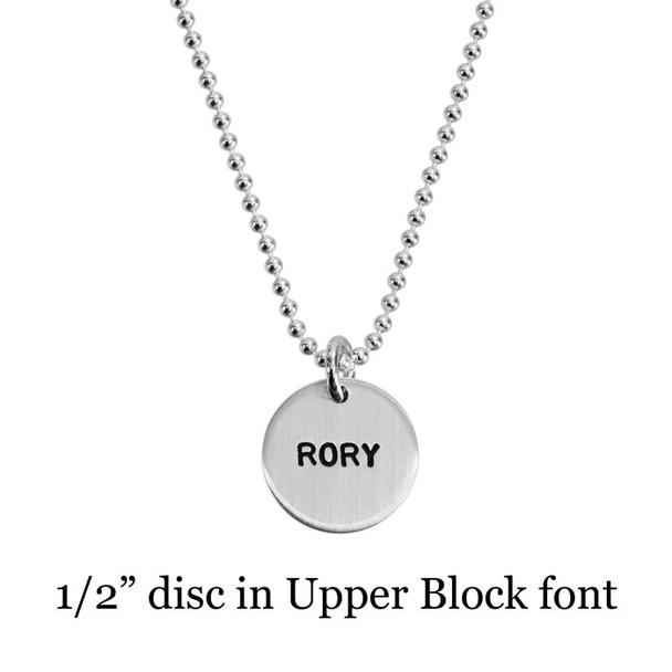 Personalized silver necklace with 1/2" disc, with son's name stamped in Block Upper font