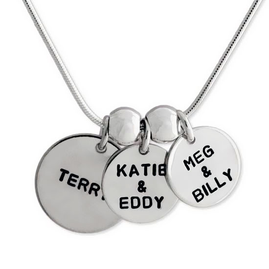 Personalized silver mother's necklace with 5/8" and two 1/2" discs, with names stamped in Block Upper font