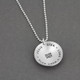 Stamping on back of curved silver disc teacher appreciation necklace, with students' names and the school year