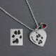 Custom silver heart necklace personalized with pet's actual paw print & name, engraved on a sterling silver heart charm, shown with silver Heart Swirl Charm with Birthstone and the original pawprint