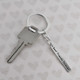 Custom silver Your Saying Key Ring, personalized with special message to best friend, shown with a key