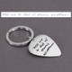 Custom sterling silver guitar pick key ring, personalized with handwritten words of wisdom from loved one, shown with original handwriting