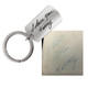 Faded handwriting used on a silver key ring
