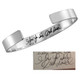 Handwriting on inside of sterling silver cuff