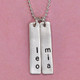Custom sculpted silver long rectangle, personalized with hand stamped kids' names, stamped lengthwise
