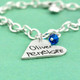 Side view of custom Silver heart handwriting bracelet, personalized with kids handwritten names, and birthstone